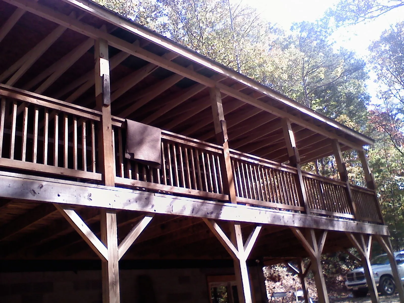 Timber framing under a new elevated porch and deck — Roof Leak Repair in Indian Hills by Roofing Brothers